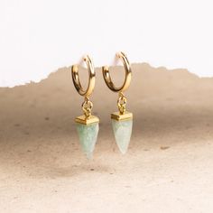 Aquamarine Pendulum Gemstone Spikes on 14k Gold Filled Huggie style earring - Minimalist, Elegant, Handmade jewelry gifts for her, mom, wife Gemstone: Genuine Aquamarine Gemstones: 19x5mm approximately Bezel: Vermeil Gold (14k Gold over Sterling Silver) Hoops Material: 14K Gold Filled Hoop Diameter: 13mm Hoop Width: 2mm Closure: FlexCatch Note that due to the handmade nature of these genuine stones, measurements are approximately and might vary slightly for each stone. Arrives in giftbox. Mad... Earring Minimalist, Store Jewelry, Gold Filled Hoops, Writing Gifts, Handmade Jewelry Gift, Aquamarine Gemstone, Sterling Silver Hoops, Jewelry Earrings Hoops, Silver Hoops