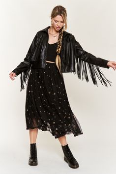 Introducing our Faux Leather Fringe Jacket - a stunning blend of classic and edgy that will elevate your style game instantly. Crafted with faux leather fabric, it exudes a luxurious look without compromising on your values. The standout feature? Exquisite faux leather fringe detailing that dances with every step you take, adding a touch of boho-chic to your outfit. With its button front closure and collared neckline, this jacket combines timeless design elements with a modern twist, ensuring you're always on-trend. The long sleeves provide both warmth and style, making it the perfect choice for any season. Get ready to turn heads and make a fashion statement with our Faux Leather Fringe Jacket - it's the ultimate piece to add flair to your wardrobe. Whether you're hitting the town or just Edgy Leather Outerwear For Party, Edgy Leather Party Outerwear, Chic Evening Biker Jacket For Fall, Fall Evening Outerwear With Zipper Closure, Edgy Faux Leather Party Outerwear, Edgy Leather Jacket For Party, Spring Leather Biker Jacket For Party, Chic Leather Jacket With Zipper Closure For Party, Edgy Outerwear For Fall Evenings