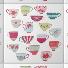 many different cups and saucers on a white background with pink, blue, green, red, and yellow designs