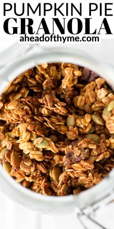 pumpkin pie granola in a glass bowl with text overlay that reads, pumpkin pie granola