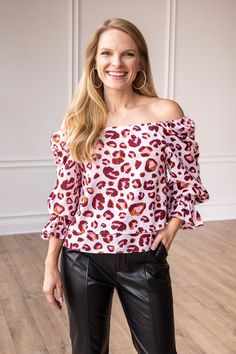 Pair this top with your favorite jeans, leggings, or a skirt for a fashion-forward ensemble that showcases your unique style. Whether you're heading out for a night on the town or looking to make a statement during a casual outing, the Wild Orchid Leopard Layered Top is the perfect choice for adding a pop of boldness and sophistication to your wardrobe.Our Model is wearing Size: Small Material: 100%Polyester Fit: True to Size Pink Stretch Top For Date Night, Trendy Tops For Night Out In Spring, Stretch Pink Top For Date Night, Trendy Blouse For Going Out In Spring, Spring Long Sleeve Tops For Going Out, Long Sleeve Tops For Going Out In Spring, Trendy Off-shoulder Tops For Day Out, Pink Blouse For Day Out In Fall, Trendy Summer Tops For Going Out