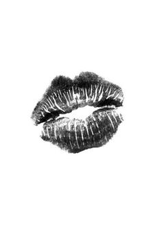 a black and white photo of a woman's lips