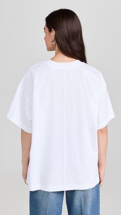 La Ligne Solid Super Oversize Short Sleeve Tee | Shopbop Oversized Batwing Sleeve Cotton T-shirt, Oversized Cotton Top With Shirttail Hem, Summer Cotton T-shirt With Batwing Sleeves, Oversized Short Sleeve Top, Cotton Batwing Sleeve T-shirt For Summer, Spring Top With Boxy Fit And Shirttail Hem, Cotton Batwing Sleeve Tops For Loungewear, Relaxed Fit Cotton Blouse With Batwing Sleeves, Spring Boxy Fit Tops With Shirttail Hem