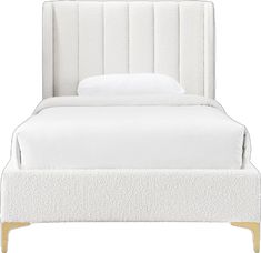 a bed with a white headboard and foot board on it's side, in front of a white background