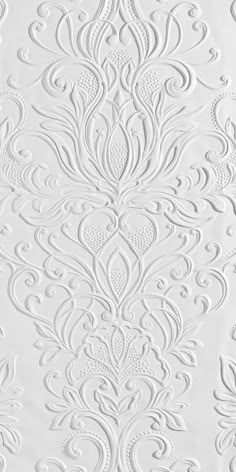 white wallpaper with intricate designs on it