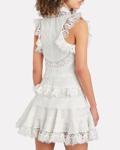 The label's Peggy dress is a romantic mini silhouette in a lace-trimmed linen and cotton blend. High neckline. Concealed back zip closure. Fully lined. Fabric: 52% linen, 48% cotton Lining: 100% cotton Dry clean Imported Embroidered Mini Dress, Unique Dresses, Bride Bridal, Wedding Bridesmaids, High Neckline, A Romantic, Guest Dresses, Skirt Top, Dresses Xs