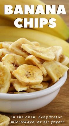 a bowl filled with banana chips on top of a wooden table