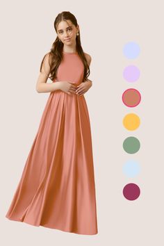 a girl in a long dress with different colors