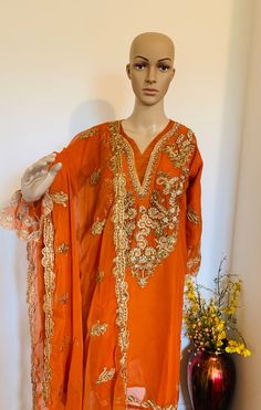 2 piece orange kurta and chiffon Dupatta  Kurta with heavy yoke Sequins, zardozi work Pearl work, golden thread work Sleeves 3/4 with beautiful cut work and embroidery  chiffon Dupatta has border and all over the small beautiful booties 3 colours available  Royal blue, orange and black Size-36"38"40"any size  Perfect for festive occasion. Luxury Orange Kurta With Sheer Dupatta, Luxury Orange Kurta With Dabka Work, Luxury Orange Dupatta With Zari Work, Luxury Orange Dupatta With Dabka Work, Luxury Orange Dupatta For Puja, Cheap Orange Zari Work Dupatta, Luxury Orange Georgette Dupatta, Luxury Orange Dupatta With Mirror Work, Chiffon Kurta