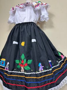 HandMade Colombian Campesina Santanderiana Dress, we have your size. Celebrate your wonderful culture. Wear our dress and be part of a beautiful tradition. Note: Each dress has a unique but similar design. Includes: Blouse and SkirtSizes:XSmall to XXLarge - Length: 36" in Approx. Note: Check the Photo Gallery to access the Size Chart Color:Black and White Material:%100 Polyester How should I care for and clean the dress?Hand-Wash or Dry-Clean, Polyester is a synthetic fiber, so to ensure it does Colombian Dress, Dress Black And White, I Care, White Material, Synthetic Fiber, Xl Dress, Dress Making, Dress Black, Photo Gallery