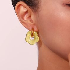 Add a touch of summer to your outfit with these Acrylic Gold Flower Earrings! Made of chunky acrylic with a bold floral design, these colorful earrings are sure to stand out and make a statement. Perfect for adding a playful and quirky touch to any outfit. Collect your favorite colors! DETAILS & SIZE Finish: 18k gold plate Material: Stainless Steel, Acrylic Measurements: Inner Diameter: 16mm; Length: 26mm Snap buckle earring closure Waterproof, tarnish-resistant, and nickel free Shop Earrings for more options! Chic Yellow Earrings For Spring, Trendy Yellow Flower Earrings For Party, Trendy Summer Flower Earrings For Pierced Ears, Yellow Trendy Flower Earrings For Party, Trendy Green Flower-shaped Earrings, Trendy Yellow Flower Earrings, Trendy Flower Charm Earrings For Spring, Trendy Summer Flower Charm Earrings, Trendy Green Flower Earrings