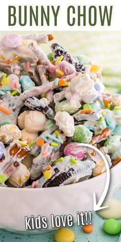 a white bowl filled with lots of candy