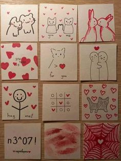 some drawings on paper with hearts and animals