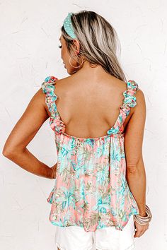 Our cute peach colored 'On A Wave Shift Top' is a spring time essential with its lightweight material, pretty blue and green tropical print, square neckline and upper back, wide ruffled sleeveless shoulder straps, and relaxed silhouette that falls into a straight hemline! on products Measurements S : Bust 32", Hip 44", Length 25", Waist 36". M : Bust 34", Hip 46", Length 25", Waist 38". L : Bust 36", Hip 48", Length 25", Waist 40". Spring Beach Tank Top With Square Neck, Square Neck Tank Top For Beach, Casual Square Neck Tank Top For Beach, Peach Tank Top For Summer, Sleeveless Peach Tank Top For Summer, Floral Print Square Neck Top For Beach, Casual Pink Square Neck Tank Top, Spring Vacation Tropical Print Tank Top, Spring Floral Print Tank Top With Ruffled Straps