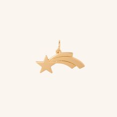 Make a wish or give a wish. The Shooting Star charm captures the eye with its distinctive shape and symbolic meaning Pair with our Cable chain or Flow necklaces, wear solo or complement with other ela charms. - Coated in 18K gold (2.5 microns) - Brass Base - Length: 20 mm - Width: 5 mm - Bail Size: 5 mm JEWELRY CARE As with all metals, special care must be taken to ensure they do not scratch or tarnish over time. Follow these simple steps to keep your pieces looking their best:Avoid direct conta Tarnish Remover, Shooting Star, Natural Sunlight, Shooting Stars, Star Charms, Make A Wish, The Eye, Cable Chain, Jewelry Care