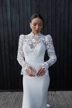 Bride in wedding dress with lace long sleeve and shoulder pads for traditional wedding look Puff Sleeve Wedding Dress, Sassi Holford, Floral Lace Wedding Dress, Contemporary Wedding Dress, Long Sleeve Wedding Dress Lace