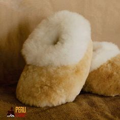 Looking for the perfect blend of luxury and comfort? Our handmade alpaca slippers, crafted by skilled Peruvian artisans, offer unparalleled warmth and softness for those chilly fall and winter days. Alpaca's natural fiber, known for its thermoregulatory properties, ensures your feet stay comfortable in any season. Product Benefits: 1. Unmatched Warmth and Comfort: Alpaca wool provides ideal thermal insulation, keeping your feet warm without overheating. 2. Artisan Durability: Each pair of slippers is handmade using traditional techniques, ensuring exceptional quality and durability. 3. Eco-Friendly and Sustainable: Made from natural alpaca fiber, these slippers are an eco-friendly choice for those who value sustainability. Product Features: - Materials: Outer lining made from baby alpaca w Alpaca Slippers, Winter Footwear, Soft Winter, Wool Slippers, Alpaca Fiber, Shoes Handmade, Mild Shampoo, Thermal Insulation, Winter Days