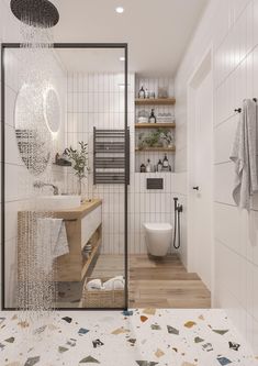 a bathroom with a shower, toilet and sink in it's center area is shown