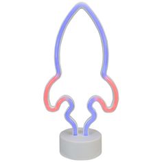 a neon light up figure on top of a white base with an oval shaped object in the middle