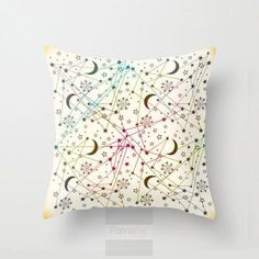 a white pillow with stars and crescents on it