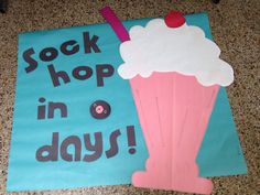 a piece of paper that says sock hop in days with a cupcake on it