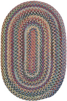 a multicolored oval rug with braiding on the bottom and sides, in various colors