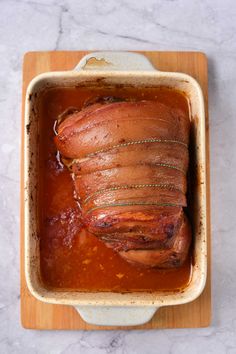 the meat is cooked and ready to be put in the oven on the cutting board