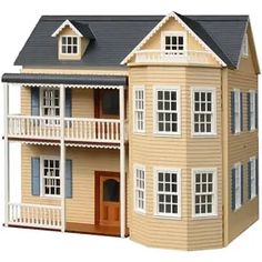 a doll house with two balconies on the second floor and one story balcony