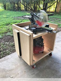 a table saw sits on top of a cabinet