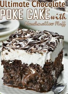 the ultimate chocolate poke cake with marshmallow frosting on top is ready to be eaten