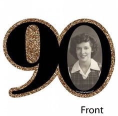 an old photo with the number 90 in it's center and gold glitters