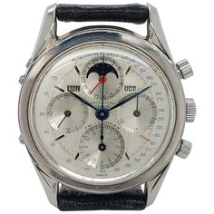 Vintage Chronograph Watch With Subdials, Vintage White Watch With Tachymeter, Timeless Collectible Watches With Tachymeter, Classic Chronograph Watch As Collectible, Classic Collectible Chronograph Watch, Collectible Analog Chronograph Watch, Black Collectible Watches With Subdials, Collectible Black Watch With Subdials, Collectible Analog Chronograph Watch With Round Dial