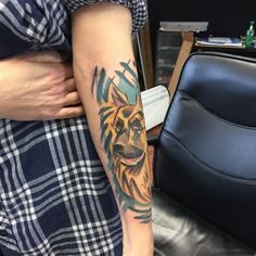 a person with a tattoo on their arm