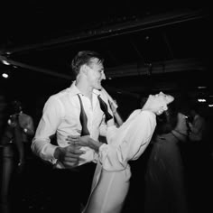 black and white photograph of two people dancing