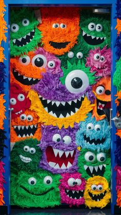 the door is decorated with many different colored monsters