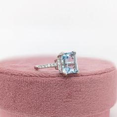 This beautiful ring features a 2.57 carat emerald cut Aquamarine gemstone with natural earth mined diamonds set in solid 14K gold. This Aquamarine ring makes a lovely March birthstone gift for your loved ones! This ring is made with solid 14K Gold and natural Earth mined SI / G-H diamonds. As listed, this ring is ready to ship. If you're interested in purchasing this setting with a different center stone please message us! Designer Silver Jewellery, Jewelry Showcases, Aquamarine Ring, March Birthstone, Birthstone Gifts, Aquamarine Rings, Aquamarine Gemstone, Natural Earth, Beautiful Ring