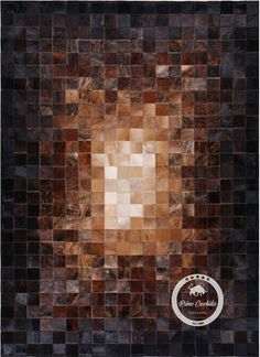 an area rug made up of various squares and rectangles in shades of brown