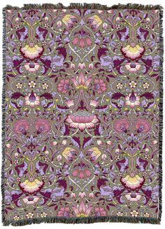 a purple and green tapestry with flowers on it