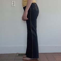 "Can't tell if these are flared bottoms or bell bottoms Tag size:9 Waist: 14\" Length: 40.25\" Bottom cuff: 9.75\" Inseam: 29.5\" if you would take a minute to follow my art instagram @dennisthelatinboy I would really appreciate that. Let me know what you think of the work. All feedback is welcome!" Retro Fitted Flares In Medium Wash, Fitted Denim Blue Cotton Flares, Fitted Denim Retro Flares, Fitted Retro Denim Flares, Retro Fitted Dark Wash Flares, Vintage Stretch High Rise Flare Jeans, Vintage High Rise Stretch Flare Jeans, Fitted Vintage Cotton Flares, Fitted Vintage Denim Blue Flare Jeans