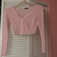 Very Cute Never Worn Pink Cardigan/Shirt. In Perfect Condition Matches Anything. Can Be Worn Alone Or Over A Piece. Cute Long Sleeve Tops With Button Closure, Trendy Button-up Cotton Sweater, Cute Long Sleeve Tops With Buttons, Pink Button-up Casual Sweater, Pink Casual Button-up Sweater, Cute Button-up Cardigan With Buttons, Pink Button-up Cotton Cardigan, Cute Button-up Cardigan With Button Closure, Pink Cotton Button-up Cardigan