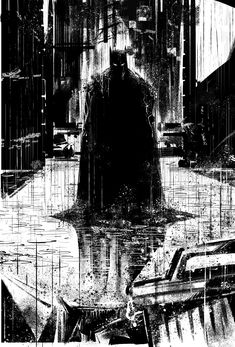 a black and white photo of batman in the rain