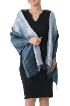 Shimmering shades of dark teal flowing into light blue distinguish this shawl with original elegance. From Vinita the shawl is hand-woven with raw silk dyed by hand. Spirit Clothing, Paw Print Jewelry, Fair Trade Clothing, Silk Shawl, Dining Accessories, Women Artisans, Blue Silk, Dark Teal, How To Dye Fabric