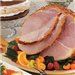 the ham is cut into slices and served with fruit