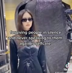 a woman wearing sunglasses standing in front of a large object with the caption, forging people in science and never speaking to them again