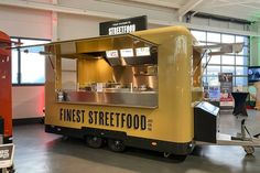 a food truck is parked in a building