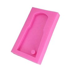 a pink plastic case with a hole in the middle for an object to be seen