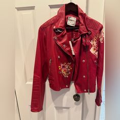 Women’s Size Small Red Leather Jacket With Floral Design Never Worn Nwt Designer Biker Jacket With Long Sleeves For Spring, Embroidered Red Outerwear For Spring, Fitted Red Biker Jacket, Red Embroidered Outerwear For Spring, Designer Red Leather Jacket For Winter, Fitted Burgundy Leather Jacket For Spring, Fitted Red Embroidered Outerwear, Trendy Burgundy Leather Jacket For Spring, Designer Red Leather Jacket For Fall