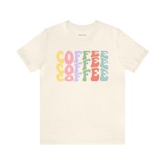 Indulge in the cute cozy charm of our pastel Coffee tee, where soft hues blend seamlessly with your love for caffeine, creating a stylish and comfy statement piece for your everyday brew adventures. Coffee t-shirts, caffeine tees, local cafe shirt S M L XL 2XL Width, in 17.99 20.00 22.01 24.02 25.98 Length, in 27.99 29.02 30.00 31.02 32.01 Sleeve length, in 8.90 9.17 9.45 9.72 10.00 Casual Coffee Slogan T-shirt, Casual Coffee Colored Slogan T-shirt, Casual Coffee T-shirt With Slogan, Coffee-colored Graphic Tee With Funny Print, Coffee Color Cotton Top As Gift, Coffee-colored Cotton Top For Gift, Casual Coffee Colored Everyday Tops, Casual Coffee Colored Top For Everyday, Coffee Cotton Top For Casual Wear