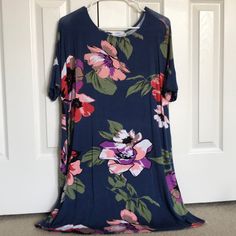 Never Worn, Blue Floral Dress With Pockets, Size Medium, Great Condition, Very Comfortable Navy Casual Floral Print Dress, Blue Floral Dress, Floral Blue Dress, Dress With Pockets, Blue Floral, Floral Dress, Color Blue, Blue Color, Size Medium