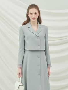 Editor's NotesFeminine ‘Lucia’ jacket thatmade of stretchy tencel blended fabric. Featuring the classic notched lapelcollar, two-button closure, and the cropped length. You can style with the dress,skirts, or pants that made of the same fabric to complete the stylish set-uplook. - Notched lapel collar- Two-button closure- Cropped length- Two-button closure at cuffs- Stretchy fabric Measurements(in.)SIZE (XS/S/M/L)- Total length: 15.35 in / 15.55in / 15.74 in / 16.14 in- Shoulder: 14.76 Skirt Coat Set, Crop Coat And Skirt, Semi-formal Spring Cropped Jacket With Suit Collar, Semi-formal Cropped Spring Blazer, Semi-formal Cropped Jacket With Suit Collar For Spring, Semi-formal Cropped Blazer For Spring, Spring Semi-formal Cropped Jacket With Suit Collar, Semi-formal Spring Cropped Jacket With Lapel Collar, Semi-formal Cropped Jacket With Lapel Collar For Spring